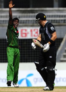 Bangladesh's Rubel Hossain (L) reacts af