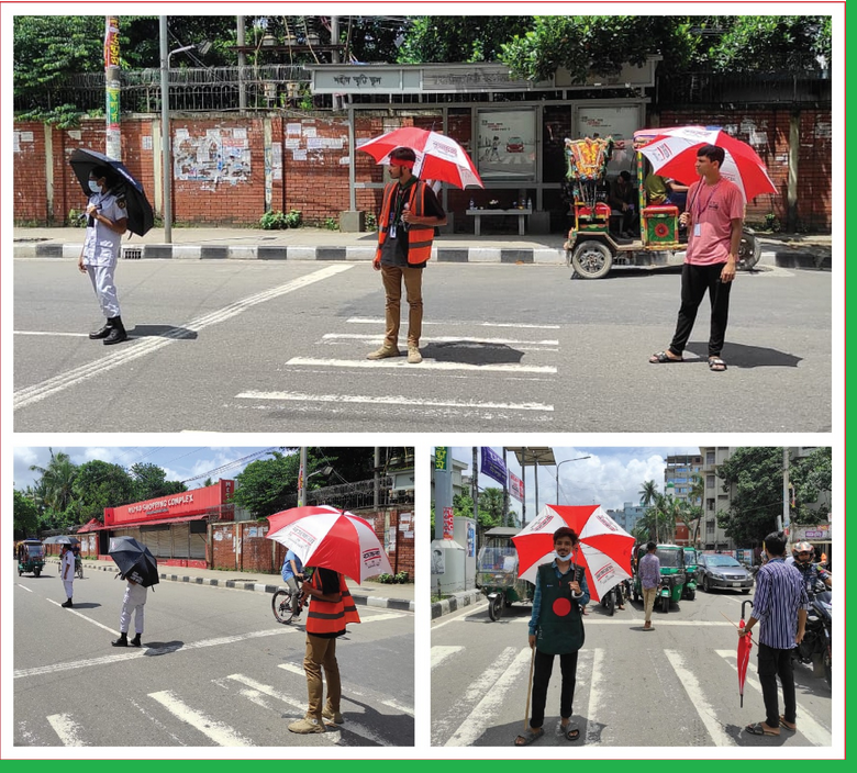 ট্রাফিকের দায়িত্বে শিক্ষার্থীরা- ছাতা দিল বসুন্ধরা সিমেন্ট